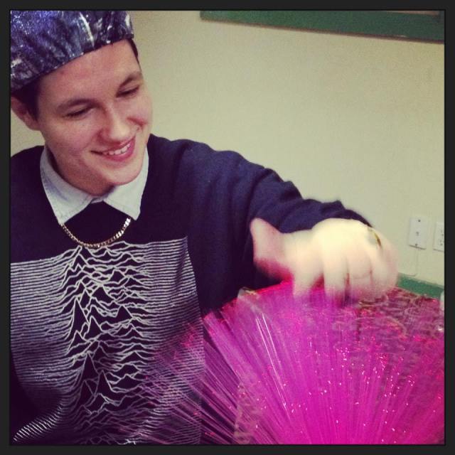 butch sticks her finger in a hot pink sparkly situation (photo by vanessa friedman)