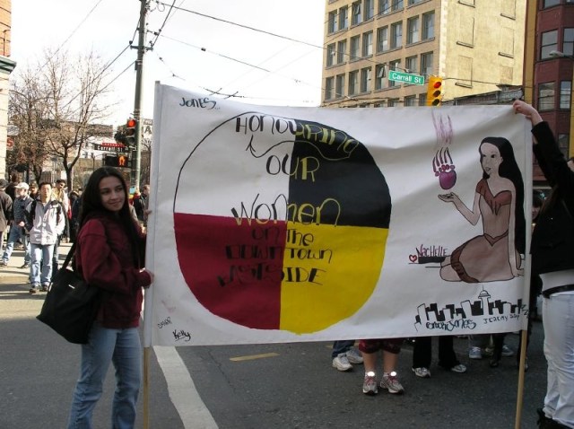 Women's memorial photo in Vancouver's Downtown Eastside, 2005,  flickr, credit Renegade98