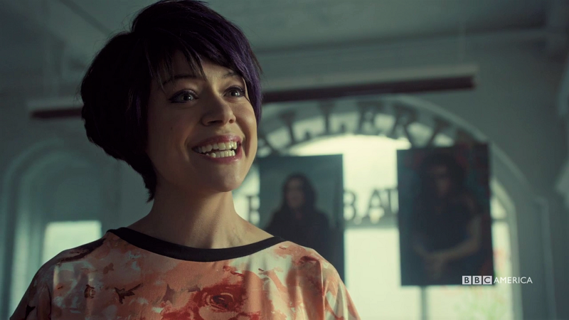 Alison smiles intensely