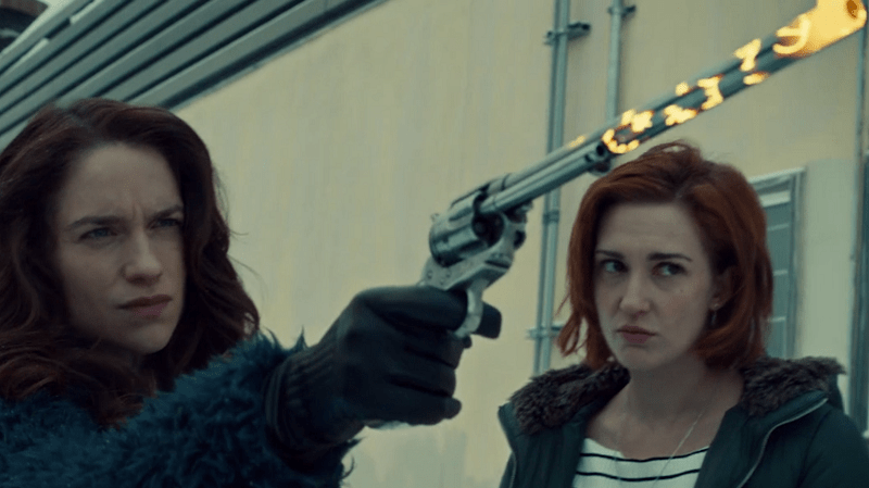 Wyonnna aims Peacemaker while Nicole watches, a little worried 