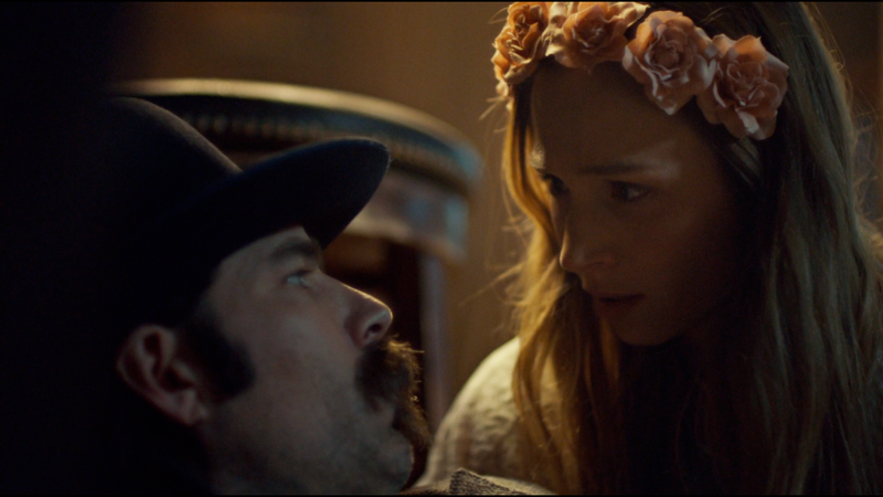 Waverly holds Doc as he dies