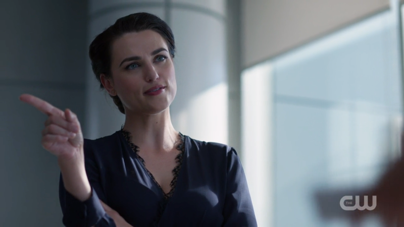 Lena points submissively to Kara