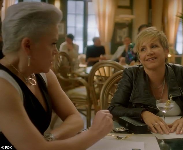 Gabrielle Carteris and Christine Elise having a meal feeling flirty