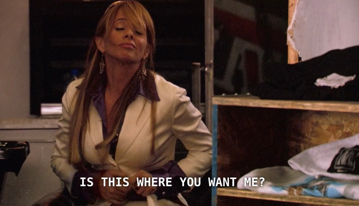 Cherie has arrived at the skate shop for Shane to cut her hair. She asks Shane, "is this where you want me?"