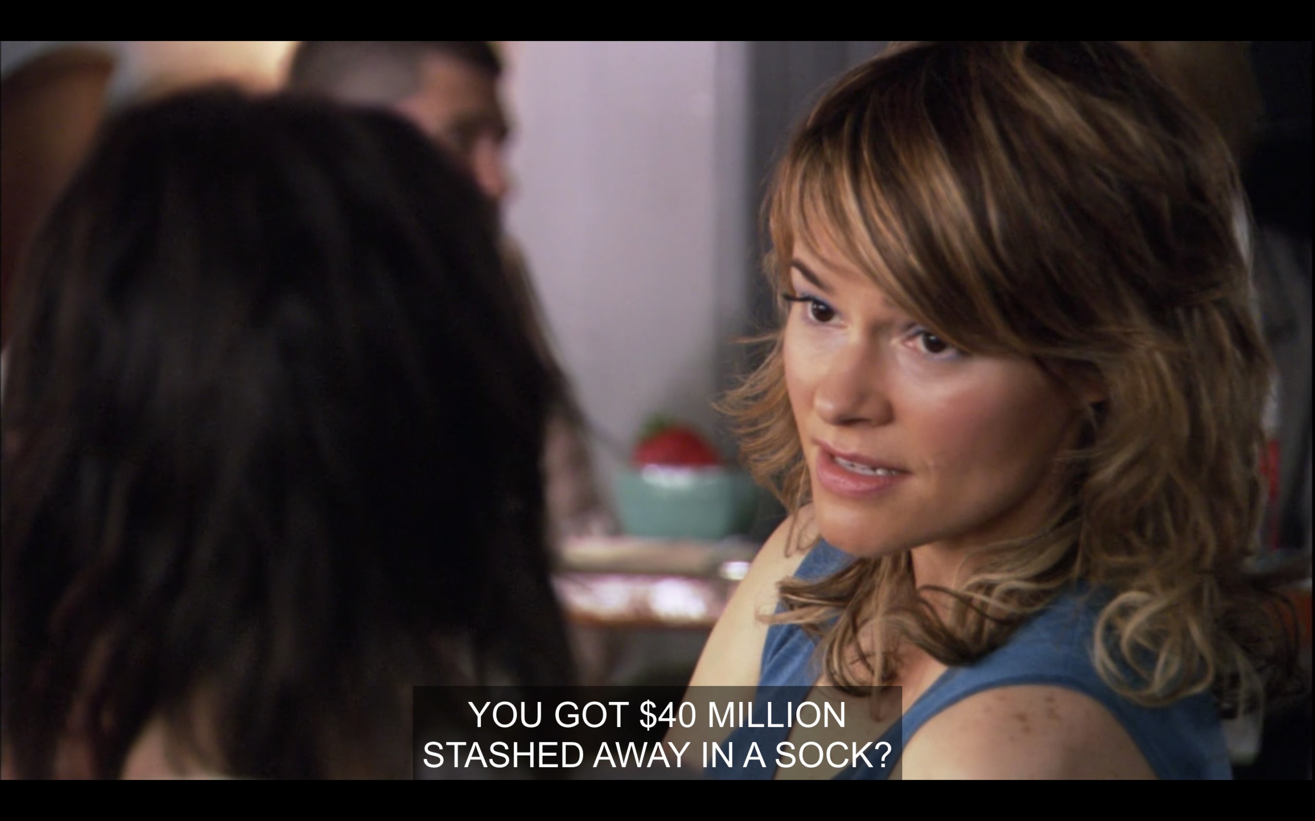Alice and Shane are at The Planet. Shane has asked Alice how she can make it up to Carmen. Alice responds, "You got $40 million stashed away in a sock?"