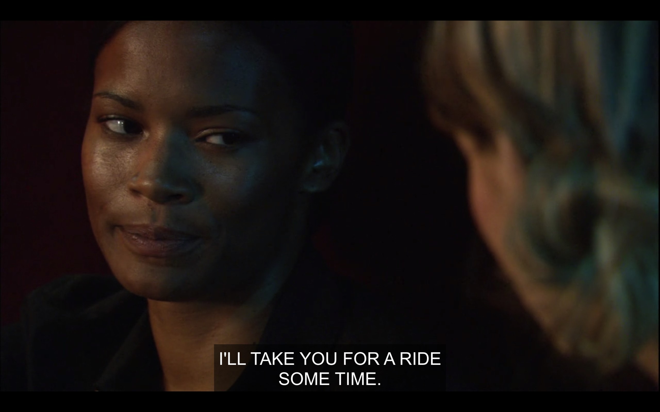 Tasha side-eyes Alice and says, "I'll take you for a ride some time."