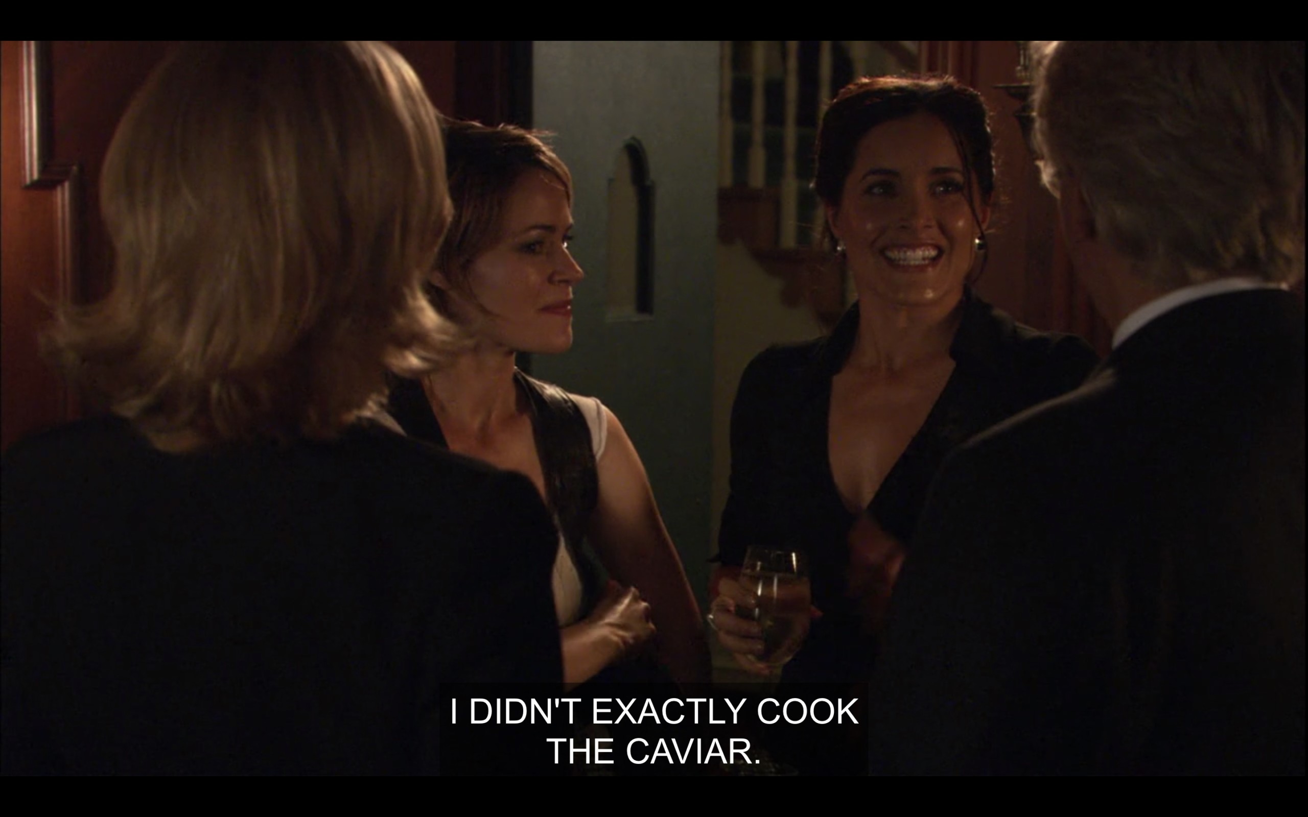 Alice Helena stand across from Phyllis and her husband. Helena says, "I didn't exactly cook the caviar."
