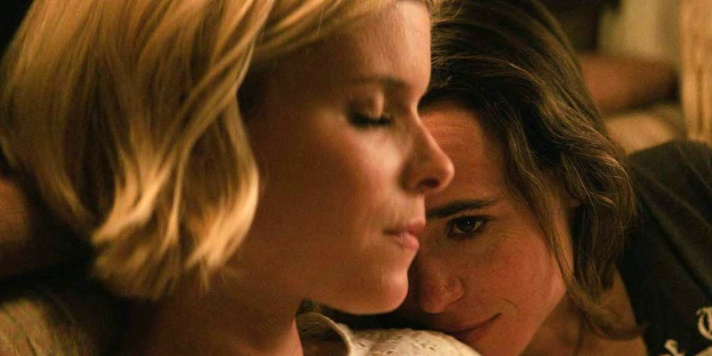 Elliot Page rests his head on Kate Mara's shoulder.