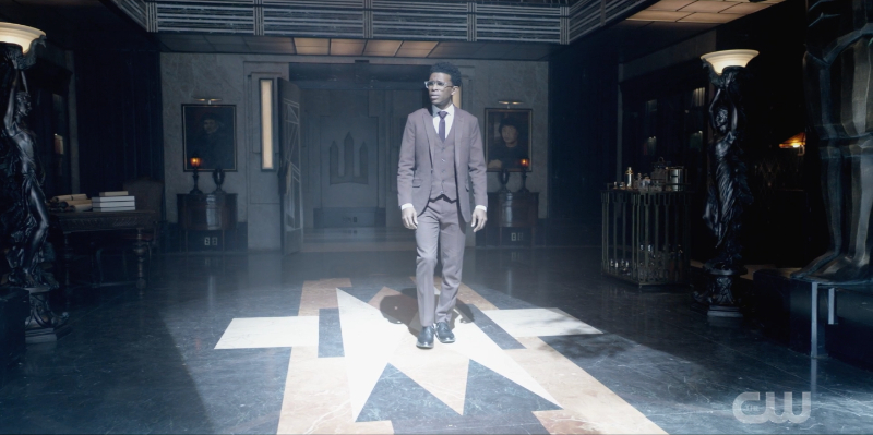 Luke Fox walking through Wayne Manor