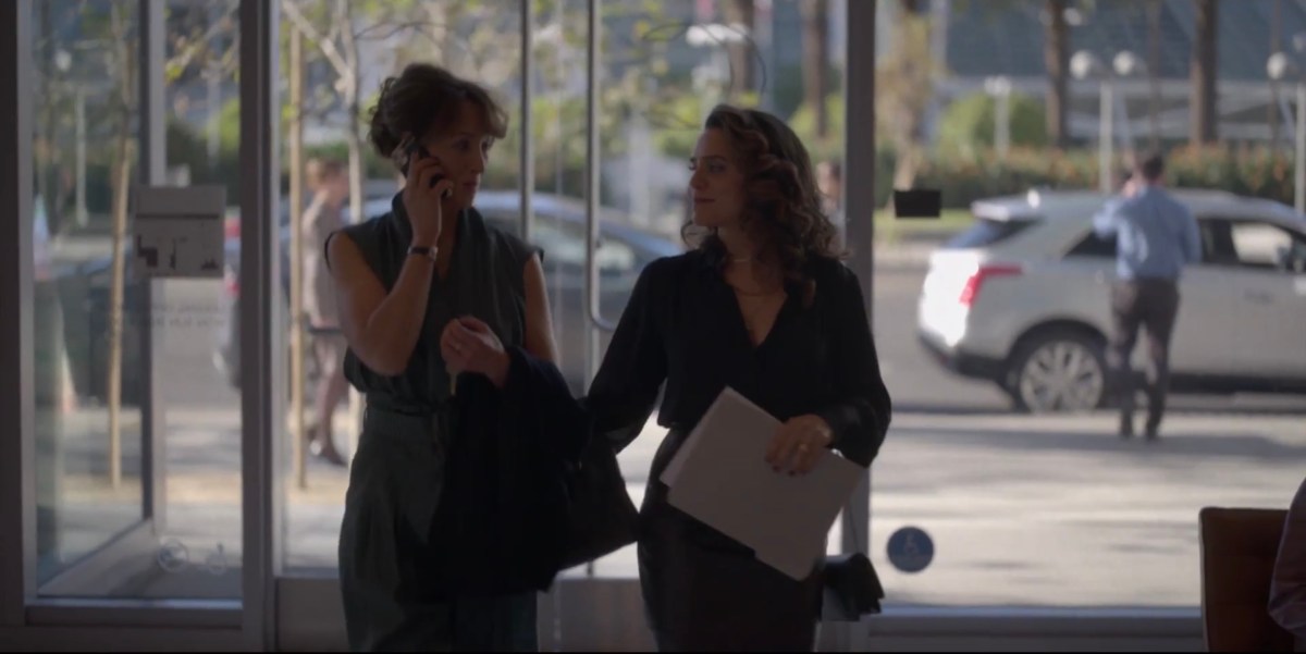 Gigi and Bette walking into a building