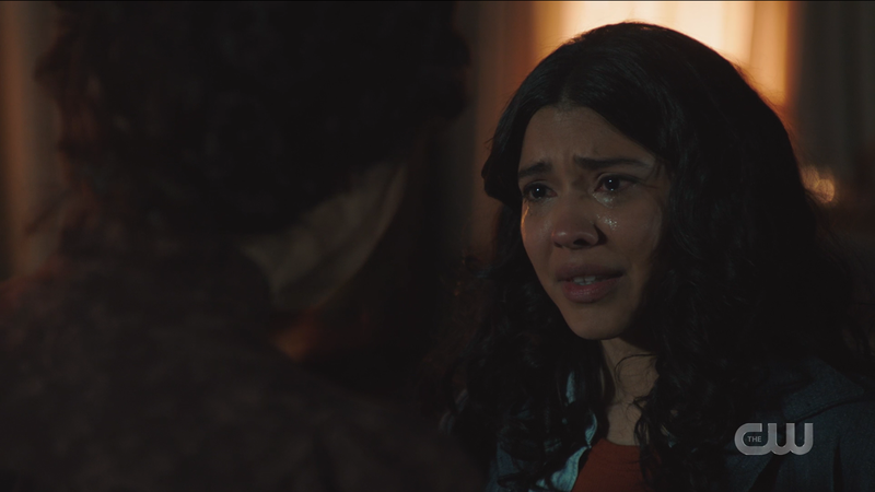 Spooner is crying as her mom is saying she's proud ofher