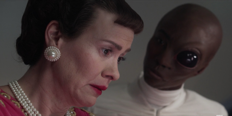 Angelica Ross as a half alien looks at Sarah Paulson as Mamie Eisenhower