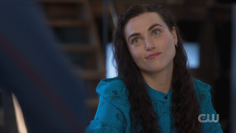 Lena smirks up at Kara