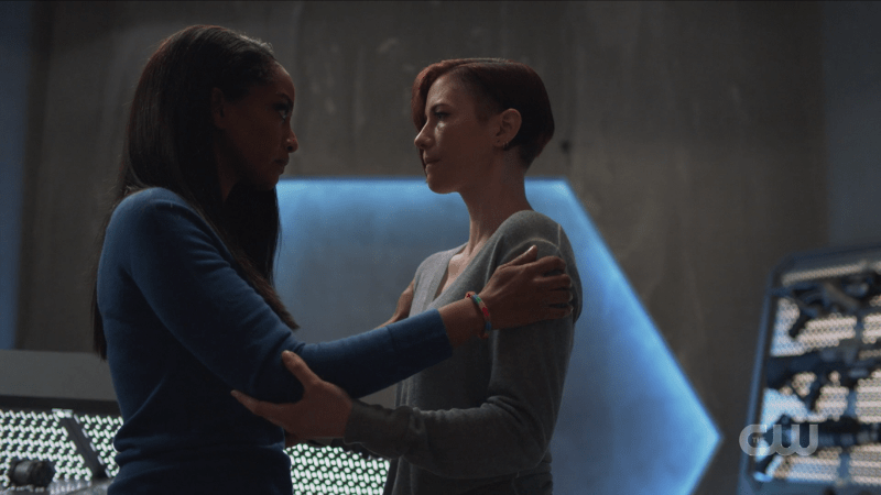 Kelly and Alex hold each other
