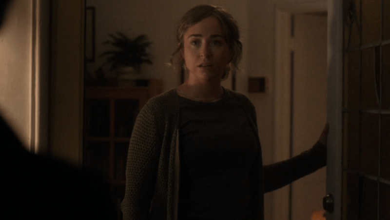 Pam stands at her doorway, looking shocked