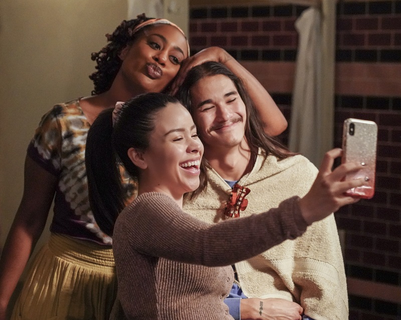 Malika, Luca and Mariana pause for a former foster kids selfie in the Coterie bathroom.