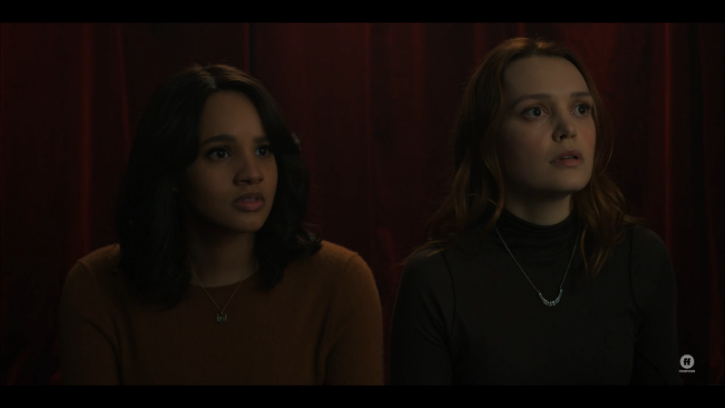 Tally looks surprised, Abigail looks neutral