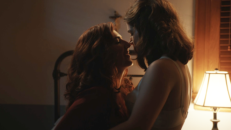 Carson and Greta kiss.