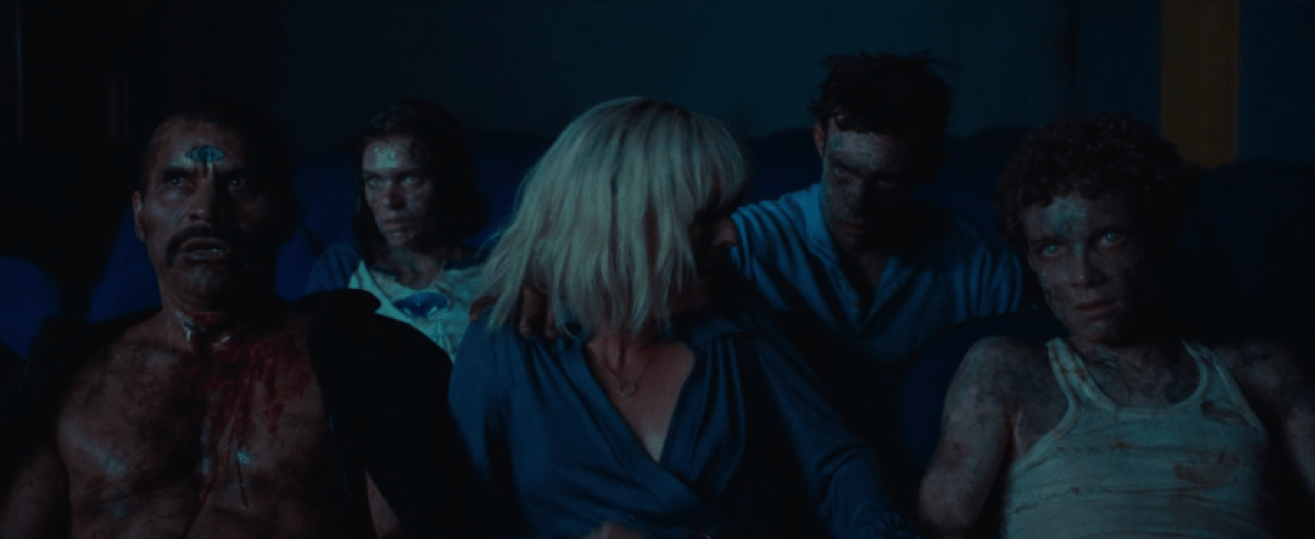 Anne is surrounded by the dead in Knife + Heart
