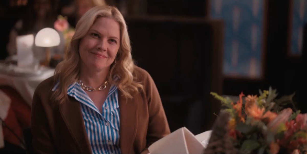 Finley's mom giving a fake smile