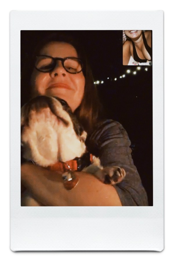 Kristen holds Lola and is on Facetime with Kayla whose cleavage you can see in her little photo in the corner