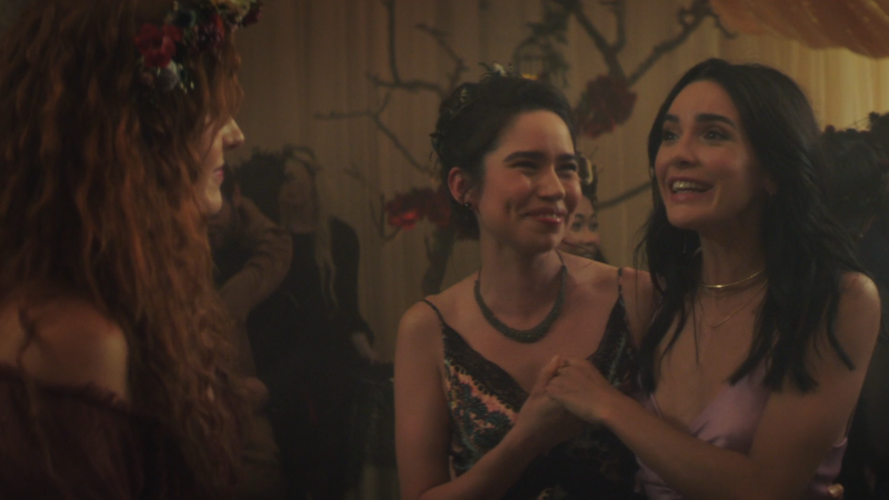 Bess and Addy giggle and hold hands while talking to Nancy