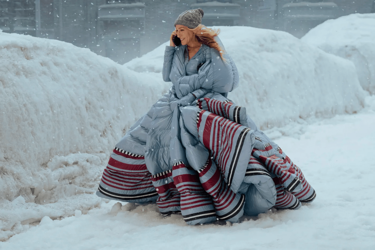 Carrie in the snow in a truly unhinged dress