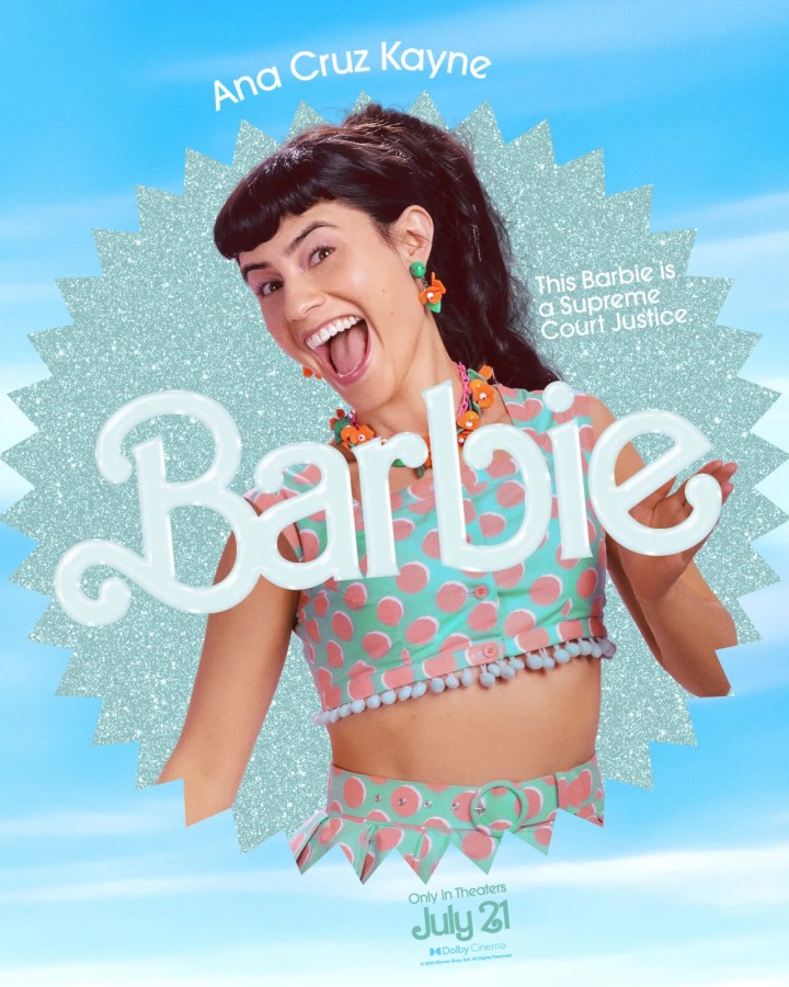 Ana Cruz Kayne as Supreme Court Justice Barbie (she's in an aqua blue and pink polka dot matching set)