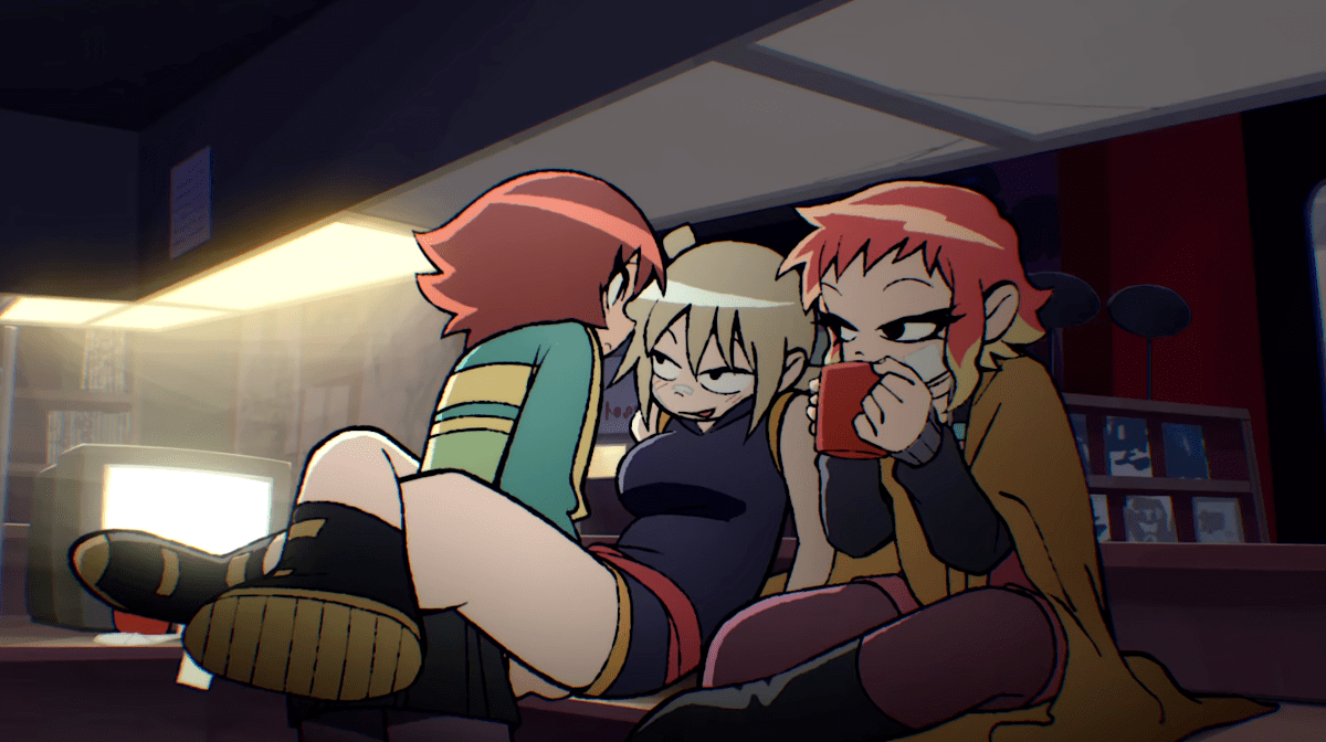 A cartoon of one girl sitting on another girl's lap facing her as a third girl sits next to them sipping from a mug.