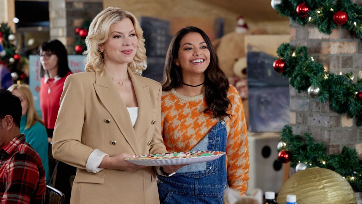 two lesbians with a platter of food